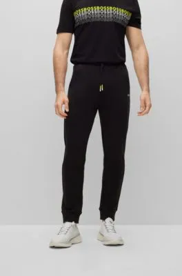 Cotton-blend tracksuit bottoms with embroidered logos 