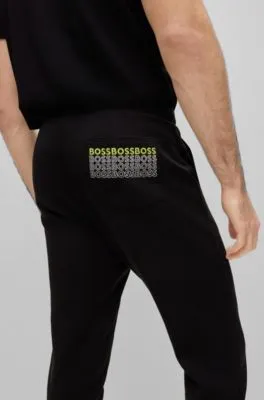 Cotton-blend tracksuit bottoms with embroidered logos 