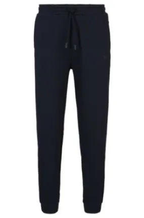 Cotton-piqué tracksuit bottoms with logo detail