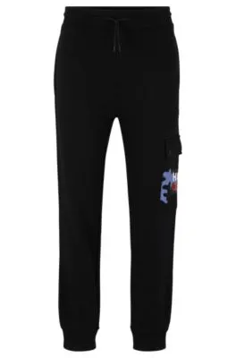 Cotton-terry tracksuit bottoms with camouflage artwork