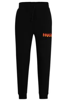 Cotton-terry tracksuit bottoms with puffed flame logo