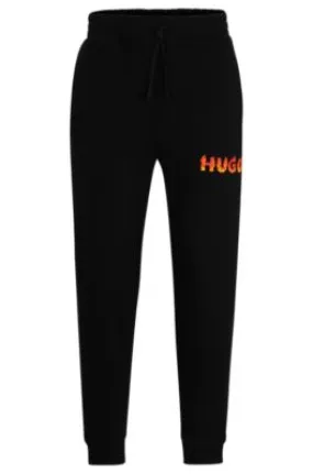 Cotton-terry tracksuit bottoms with puffed flame logo