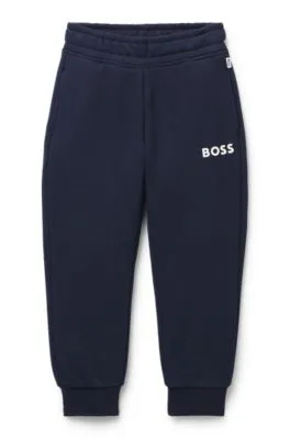 Kids' tracksuit bottoms with logo print