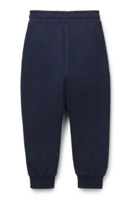 Kids' tracksuit bottoms with logo print