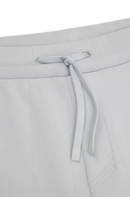 Tracksuit bottoms in a drop-needle cotton